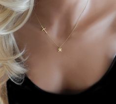 "THE CROSS AND INITIAL NECKLACE This sweet and delicate necklace comes with one initial and a sideways cross. ✦ 14k gold filled or sterling silver chain and components ✦ Script style premium gold vermeil or sterling silver letter charm- approximately 3/8\" ✦ Gold vermeil or sterling silver cross (23mm × 10mm) ✧ Necklace is shown at 18\" ✦ C A R E ∙ T I P S Although the initial disc, chain, rings and clasp are all gold filled or sterling silver, the gold letter charm is plated and should not be w Cheap Personalized Cross Pendant Jewelry, Cheap Personalized Silver Cross Necklace, Cross Necklace With Date, Cross Necklace With Initial, Affordable Personalized Cross Pendant Jewelry, Affordable Cross Pendant Necklace For Anniversary, Cheap Personalized Cross Necklace, Cheap Gift Cross Necklace, Cheap Engraved Cross Necklace