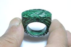 Buyer Will Receive 1 Piece Natural Malachite Full Carved Single Gemstone Made Ring.you will really love it.you will gift it to your love ones and friends. Product Details Product Name - Natural Malachite Full Carved Single Gemstone Made Ring. Gemstone - Natural Malachite Quantity - 1 Piece 100% Natural ----------------------------------------------------------------------------- THIS BEAUTIFUL ITEM IS AVAILABLE ONLY ON ETSY ------------------------------------------------------------------------ Green Carved Rings Perfect For Gifts, Green Carved Rings For Formal Occasions, Formal Carved Green Ring, Formal Green Carved Ring, Green Carved Rings For Anniversary, Spiritual Green Rings For Collectors, Green Malachite Rings For Anniversary, Green Malachite Rings As A Gift, Green Spiritual Ring For Collectors