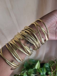 Handmade and high quality stackable raw brass bracelets. 100% Raw Brass features the authentic look of traditional African bangles.  High quality & stackable. Available as a set of THREE, FIVE or TEN Be sure to store in a dry and cool space. African Bangles, Dope Jewelry Accessories, Bracelets Boho, Stackable Bangles, Brass Bangle, The Bangles, Dope Jewelry, Brass Bracelet, Stacked Bangles