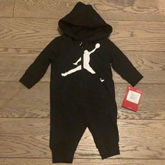 Newborn Jordan Onesie.Black Zip Up With A Hood. Size 3mos. Black Cotton Onesie For Playwear, Casual Black Onesie For Playtime, Casual Black Long Sleeve Onesie, Jordan One, Jordan Ones, Newborn Onesies, Jordan Black, Kids Jordans, Newest Jordans