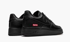 The Supreme x Nike Air Force 1 Low “Box Logo - Black” is a Spring 2020 release that features minimal branding for a clean aesthetic. Joining a crisp all-white colorway, the black-based look features a smooth leather upper with a mini red Supreme Box Logo printed on the heel. A gold-accented “AF1” emblem covers the bottom of the laces near the perforated toe. Tonal Nike Air branding covers the tongue tab and heel to finish off the look. Each pair also comes with a set of Supreme-branded shoe lace Tenis Air Force, Black Supreme, Supreme Shoes, Nike X Travis Scott, Supreme Logo, Supreme Box Logo, Low Air Jordan 1, Baskets Adidas, Baskets Nike