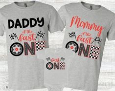 two shirts that say daddy and mommy are the first ones to be born in one