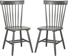 two wooden chairs side by side on a white background