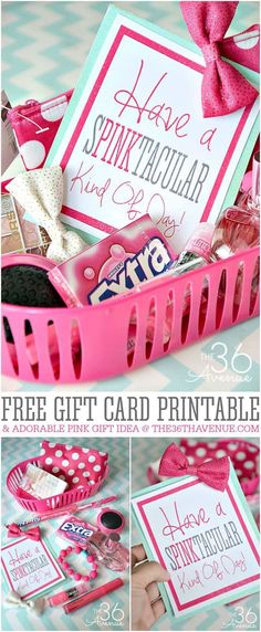 a pink basket filled with lots of cards and other items on top of a table