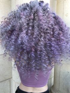 Periwinkle Curly Hair, Lilac Hair Curly, Curly Purple Hair Black Women, Pastel Purple Curly Hair, Lavender Curly Hair Black Women, Curly Pastel Hair, Ash Mauve Hair, Vivid Curly Hair, Lavender Hair Curly