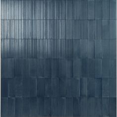 an image of a wall that is made out of metal sheets and has been painted blue