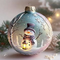 a glass ornament with a snowman holding a lantern