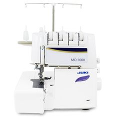 the juki mo - 100 sewing machine is white and has four needles on it