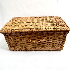 an empty wicker basket on a white background