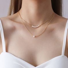 Style: Female Material: Titanium Steel, Imitation Pearl Pearl Type: Uncultured Pearl Color: White Necklace Length: 40+5cm Pearl Chain Layered Necklace As A Gift, Alloy Pearl Necklace As A Gift, Layered Metal Necklace With Pearl Chain For Gift, Pearl Chain Metal Layered Necklace For Gift, Metal Layered Necklace With Pearl Chain For Gift, Trendy Pearl Jewelry With Delicate Chain, Pearl Necklace With Clavicle Chain As Gift, White Alloy Pearl Necklace For Gift, White Pearl Necklace In Alloy For Gift