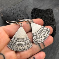 Simple yet beautiful silver triangular earrings, with small hand stamped details. Perfect earrings for any occasion, easy to match to any outfit. This are flat and light weight what makes them easy to wear. A pair to wear and never take off. They are 3.4cm- 1.45inch long 3.3cm- 1.30inch wide. They have a drop length of 5cm- 2 inch A unique addition to your jewelry collection. To see more unique silver earrings, click the link below https://www.etsy.com/shop/AkashiJewelry?ref=seller-platform-mcna Triangle Metal Earrings For Gift, Sterling Silver Triangle Earrings For Pierced Ears, Handmade Triangle Sterling Silver Jewelry, Handmade Sterling Silver Triangle Jewelry, Sterling Silver Triangle Jewelry With Matching Earrings, Nickel-free Triangle Sterling Silver Jewelry, Nickel-free Silver Triangle Jewelry, Nickel Free Triangle Metal Earrings, Nickel-free Metal Triangle Earrings