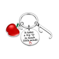 an apple keychain with the words it takes a big heart to teach little minds