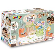 a play set with flowers in the box