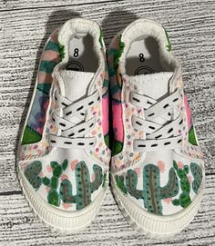 Add a fun touch to your little girls wardrobe with these size 8 colorful cactus sneakers🌵 This would also be a perfect gift for someone special! **I only use quality waterproof acrylic paint, which makes my artwork very durable and permanent** **Hand Wash Recommended** Custom Order OPTION - If you are interested in placing a custom order, please message me. I would love to work with you to create the design of your choice! Comfortable Green Canvas Shoes With Round Toe, Trendy Multicolor Non-slip Sneakers, Casual Lace-up Sneakers With Soft Sole, Casual Green Canvas Shoes With Round Toe, Non-slip Lace-up Canvas Shoes For Spring, Non-slip Lace-up Spring Canvas Shoes, Trendy Green Closed Toe Sneakers, Non-slip Low-top Canvas Shoes For Spring, Playful Multicolor Spring Sneakers