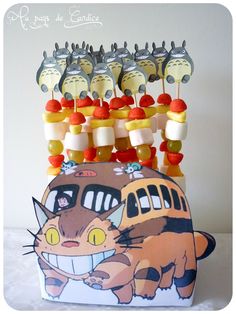 an assortment of lollipops and candies in the shape of cats