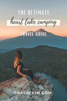 a woman sitting on top of a rock with the text, the ultimate heart lake camping travel guide