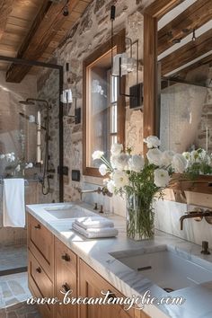 a bathroom with two sinks and a large mirror