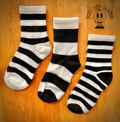 Add a fun, retro touch to your wardrobe with these charming black and white striped socks from Knit Wit Socks!  Crafted with care, these cozy socks feature bold, classic stripes, offering a timeless yet quirky design.  Perfect for everyday wear, whether you're lounging at home or stepping out in style. These socks are made from soft, breathable fabric, ensuring both comfort and durability. 95% Polyester 5% Elastane Now, let's keep them looking and feeling fabulous with these essential washing in Black And White Striped Socks, Cozy Socks, Knitted Wit, Striped Socks, Quirky Design, Casual Socks, Socks And Hosiery, Fancy Dresses, Hosiery