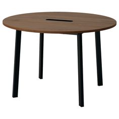 a round wooden table with black legs