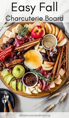 an easy fall charcuterie board with apples, cinnamons, apples and spices