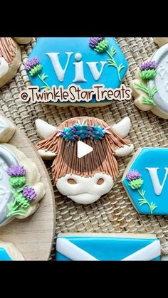 decorated cookies are arranged in the shape of cow heads and wreaths on top of each other