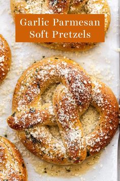 garlic parmesan soft pretzels with powdered sugar on top