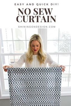 a woman holding up a curtain with the words easy and quick diy no sew curtain