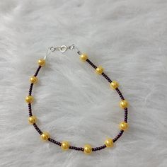 Handmade Beaded Bracelet Yellow And Purplish Beads. Spring Hook Closure. Support An Artist! Not Hypoallergenic. Please See Photos For Measurements. Yellow Beaded Chain Bracelets, Yellow Beaded Chain Bracelet, Elegant Yellow Beaded Bracelets With Gold Beads, Elegant Yellow Beaded Bracelet With Faceted Beads, Elegant Yellow Beaded Bracelet With Gold Beads, Yellow Beaded Bracelets With Colorful Beads As A Gift, Yellow Beaded Bracelet With Colorful Beads For Gift, Yellow Beaded Bracelet With Multicolor Beads As Gift, Yellow Beaded Bracelet As A Gift