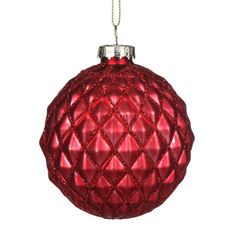 a red christmas ornament hanging from a chain