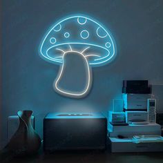 an illuminated mushroom is on the wall next to other items