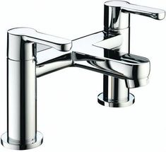 a chrome faucet with two handles and nozzles