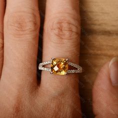 It is a citrine ring. The main stone is 8 mm*8 mm cushion cut.weight about 1.50 carats. The basic metal is sterling silver and plated with rhodium/14k white gold/14k rose gold/14k yellow gold You can also go to my shop Home for more elegant rings: https://www.etsy.com/shop/godjewelry?ref=hdr_shop_menu Customization is always welcome and please feel free to contact with me if you have any design ideas! Citrine Cushion Cut Jewelry For Anniversary, Silver Solitaire Engagement Ring, Engagement Ring Cushion Cut, Yellow Gemstone Ring, Engagement Ring Cushion, Yellow Citrine Ring, Red Gemstone Ring, November Birthstone Ring, January Birthstone Rings