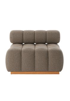 a gray couch sitting on top of a wooden frame