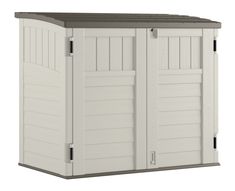 a large white storage shed with two doors