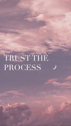 the words trust the process against a background of cloudy sky and moon in white letters