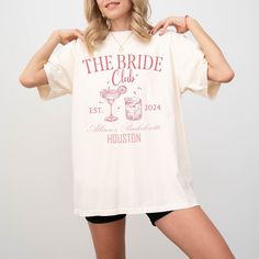 ✨CONTACT US FOR MORE COLORS✨ 👰 Make your bridal party stand out with our custom bridal party t-shirts! 🎉 Whether you're celebrating a custom bachelorette party, bridal shower, or the big day itself, these personalized tees add a fun and stylish touch to your wedding festivities. Choose from a variety of designs, colors, and sizes to match your wedding theme and suit every member of your bridal party. Made with high-quality materials for comfort and durability, these tees are perfect for gettin Bridal Party Tshirts, Bride T Shirt, Party T Shirts, Custom Bachelorette, Party Stand, Wedding Festivities, Bridal Party Shirts, Bachelorette Party Shirts, Bachelorette Weekend