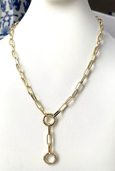 FREE SHIPPING! This is a beautiful Gold Filled Paperclip Chain Necklace with 2 Round Charm Holder rings that open. Available in 18k yellow or white gold filled.  Available in your choice of custom length with 2 inch adjustable extender.  Drop is 2 inches including both rings. Rings are 14mm.  Link is the perfect size, not too big, not too small. 5 x 12mm. Just right! Lobster clasp.  Stunning! To keep your jewelry in excellent condition: 1) Avoid contact with water, perfume and lotion. 2) Remove during physical activities. 3) Store separately in an airtight box, plastic bag or soft pouch 4) Remove before going to bed. Round Charm Necklace With Adjustable Chain, Gold Plated Paperclip Jewelry With Lobster Clasp, Classic Gold Lariat Necklace Perfect For Gifts, Modern Gold Jewelry With Paperclip Chain, Everyday Gold Lariat Necklace With Lobster Clasp, Modern Gold Paperclip Jewelry, Gold Metal Lariat Necklace With Lobster Clasp, Yellow Gold Plated Paperclip Jewelry, Gold Jewelry With Spring Ring Clasp And Oval Link