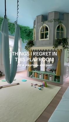 there is a playroom in the middle of this room with toys on the floor