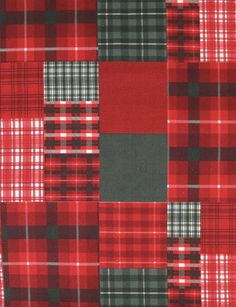 a red and black plaid fabric with squares