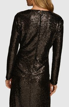 A cinching tie at the waist creates elegant shape on this sparkly sequin-drenched top that's party perfect and ready to shine at your next event. Back zip closure Jewel neck Long sleeves Attached waist tie Lined 95% polyester, 5% spandex Dry clean or hand wash, line dry Imported Favorite Daughter, Romantic Dress, Jewel Neck, Long Sleeve Midi, Designer Clothes For Men, Long Sleeve Midi Dress, Donna Karan, Comfortable Dress, Autumn Fashion Women