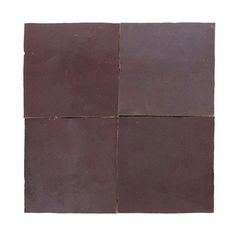 four square pieces of brown tile on a white background