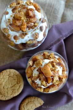 two desserts are sitting on a table next to each other