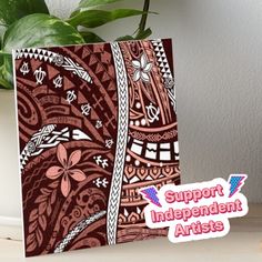 a card with the words support independent artists on it next to a potted plant