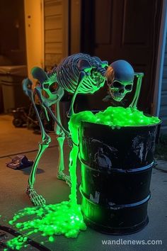 glow in the dark halloween decoration with skeleton and bucket full of green liquid on front porch