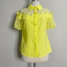 Floral Appliqu Mesh Short Sleeve Button Down Blouse Shirt Yellow Size Large Measures: 24” Length New With Tags Trendy Blouse With Collar And Buttons, Spring Blouse With Buttons And Collared Neckline, Trendy Summer Blouse With Collared Neckline, Spring Party Collared Shirt, Spring Party Button-up Tops, Fitted Collar Blouse For Summer, Spring Party Shirt With Collar, Party Blouse With Collar And Buttons, Collared Shirt With Buttons For Spring