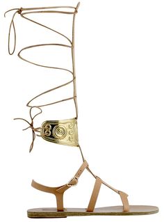 Ancient Greek Sandals x Ilías Lalaoúnis  Sandales montantes en cuir et détails métals, 535 euros. Greek Accessories, Greek Costume, Egyptian Fashion, Carly Simon, Fantasias Halloween, Greek Clothing, Ancient Greek Sandals, Greek Sandals