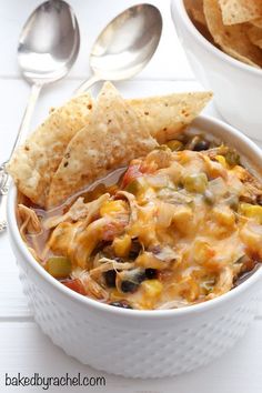 a bowl of mexican chicken dip with tortilla chips