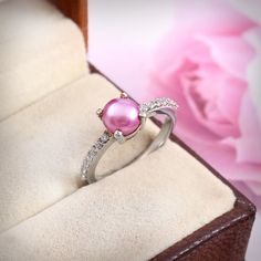 Beautiful Natural Pink Pearl Ring For personal use and For Gift PRODUCT DETAILS:- Material: 925 Sterling Silver GEMSTONE DETAILS:- Name: Pink Pearl Color: Round Size: All Size Available  Shape: Round 100% Natural Pink Pearl Ethically sourced. We Are manufacture of jewelry and Gemstone all Type Jewelry and Gemstone  You Can Contact fell Free. We have available Wholesale price  We Accept Bulk and Customized Order   The beauty of natural stone is that no two pieces are exactly alike. Natural stone products inherently lack uniformity and are subject to variation in aesthetics such as color, shade, finish. Natural stone is just that, a material that is nature-made. Each Natural Gemstone is unique and sade and color variations are inherent in natural stone. Natural Variation in Natural Stone. A Cubic Zirconia Jewelry With Accent Stones For Proposal, Round Cut Jewelry With Accent Stones For Proposal, Cubic Zirconia Pearl Ring With Prong Setting For Promise, Sterling Silver Jewelry With Diamond Accents For Proposal, Silver Ruby Ring With Stones For Wedding, White Gold Pearl Promise Ring With Center Stone, Cubic Zirconia Crystal Ring With Gemstone For Proposal, Elegant Silver Pearl Ring For Promise, Silver Jewelry With Diamond Accents For Proposal