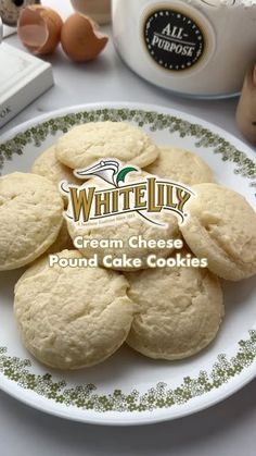 a white plate topped with cream cheese pound cake cookies