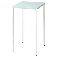 a small table with white legs and a light green top, on a white background